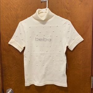 Bebe short sleeves turtleneck NWT size large